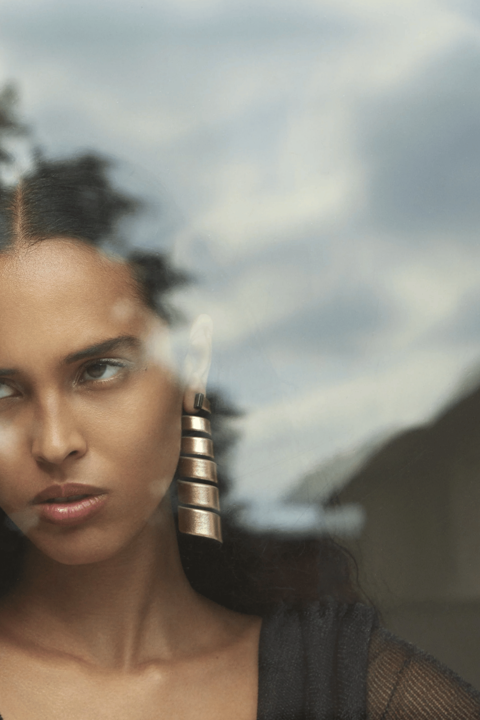Tirabaci Earrings