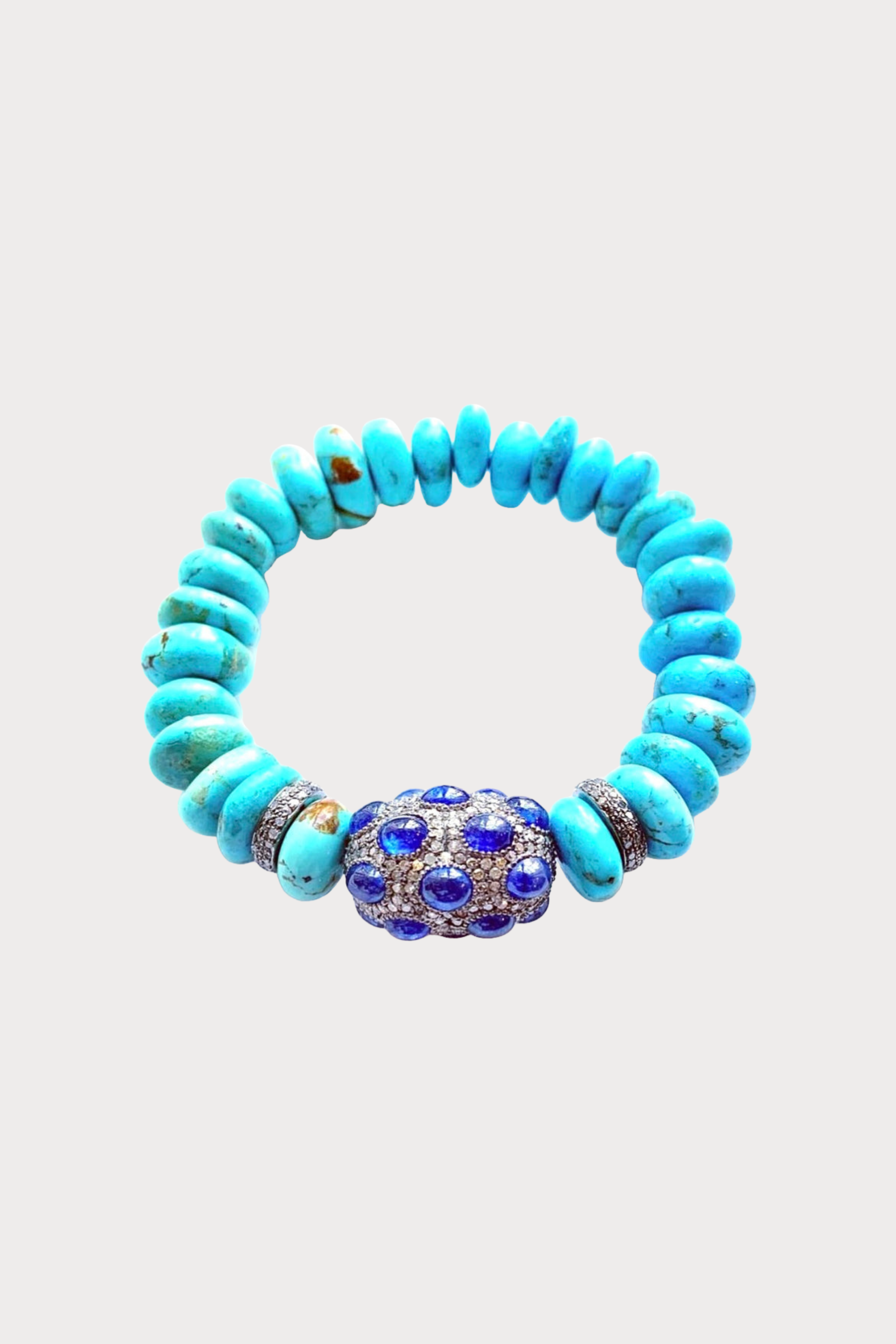 Turquoise Stretch Bracelet with a Diamond and Sapphire Charm